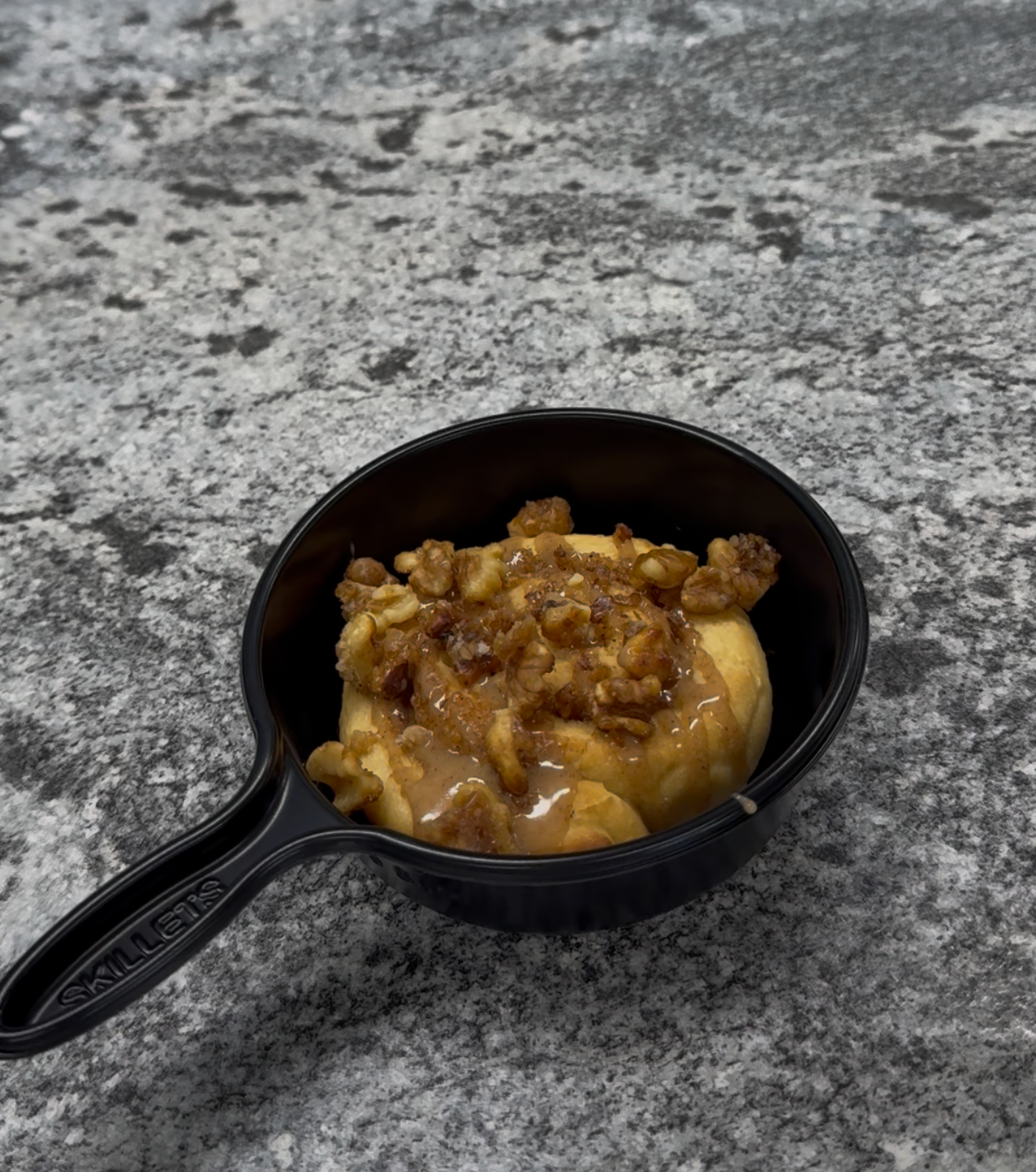 cinnamon roll in a skillet